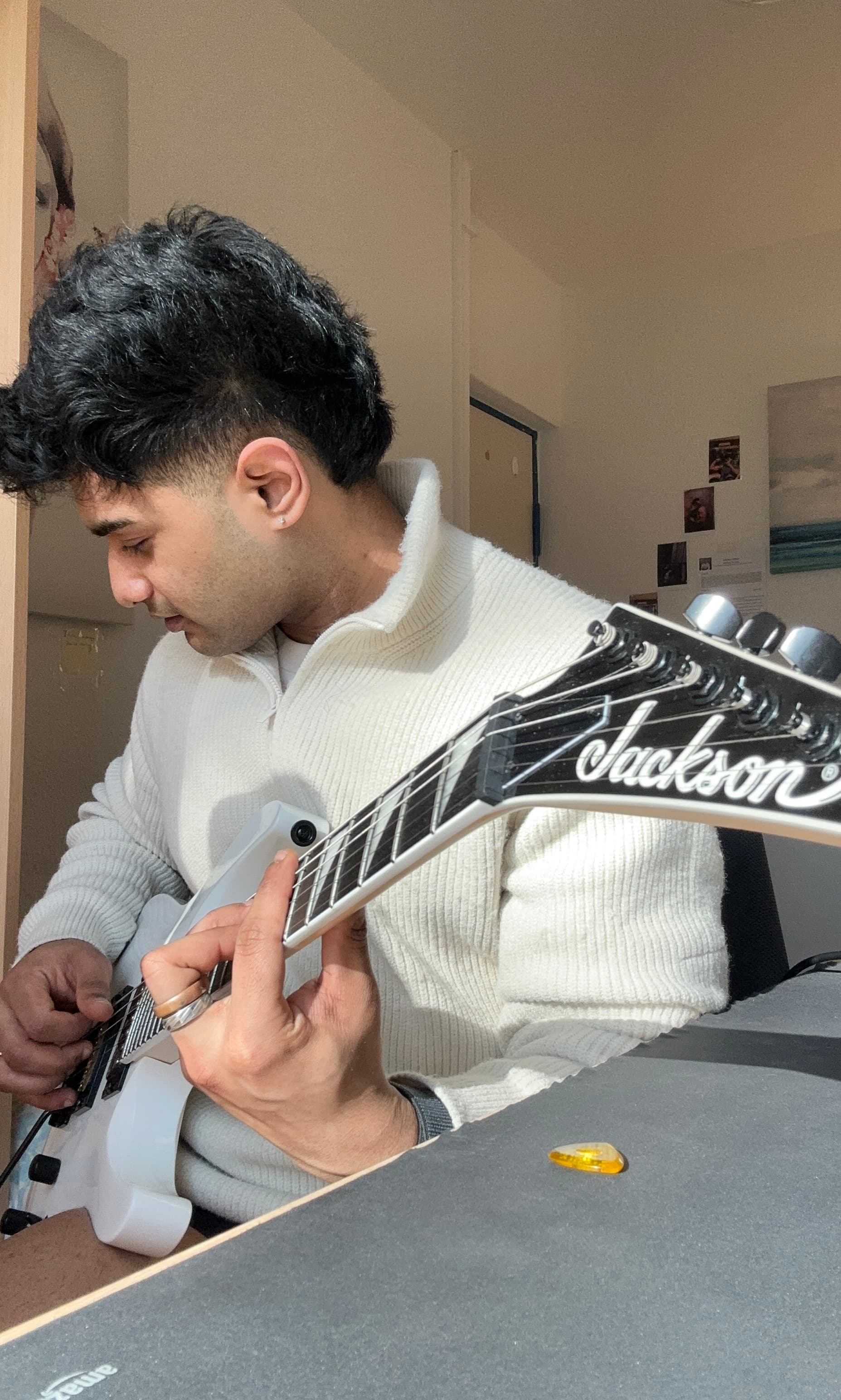Sonny playing an electric guitar