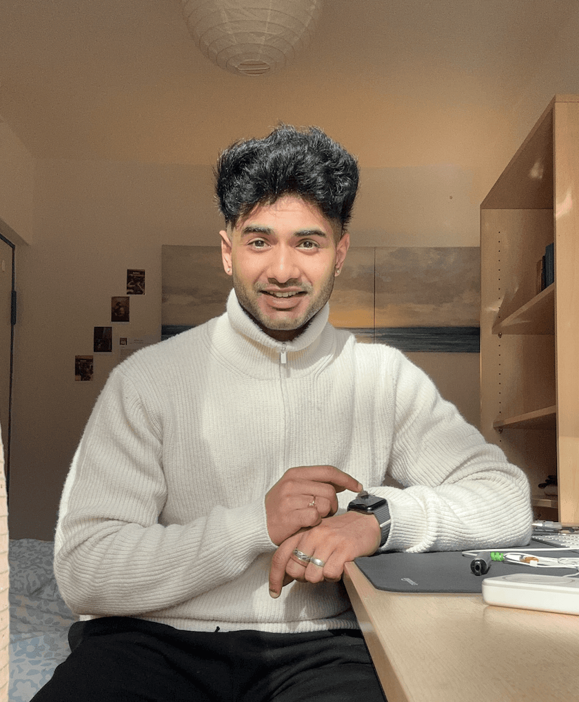 Sonny Sarkar smiling at a desk